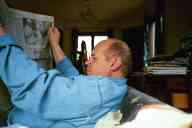(Hartland, Thanksgiving 2001) Dad reading paper