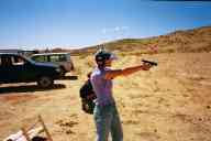 (Shooting at chez Maly, August 2002) Sasha Garofalo shoots Glock