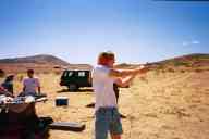 (Shooting at chez Maly, August 2002) John shoots S&W 629