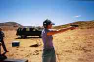 (Shooting at chez Maly, August 2002) Sasha Garofalo ahoots Glock