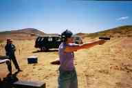 (Shooting at chez Maly, August 2002) Sasha Garofalo shoots Glock