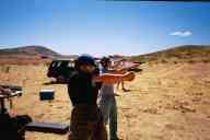 (Shooting at chez Maly, August 2002) Jen Swan shoots E.G. Makarov
