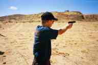 (Shooting at chez Maly, August 2002) Zak Smith shoots CZ-75B-SA