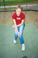 (Playing in Denver, August 2002) Sasha Garofalo on swing at City Park