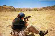 (Shooting at chez Maly, August 2002) Jen Swan shoots Ruger 10/22 