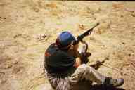 (Shooting at chez Maly, August 2002) Jen Swan shoots Ruger 10/22 
