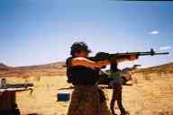 (Shooting at chez Maly, August 2002) Jen Swan shoots M96 Rifle