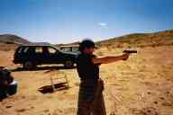 (Shooting at chez Maly, August 2002) Jen Swan shoots CZ-75B-SA