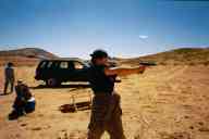 (Shooting at chez Maly, August 2002) Jen Swan shoots CZ-75B-SA
