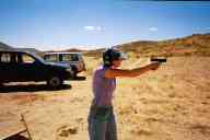 (Shooting at chez Maly, August 2002) Sasha Garofalo shoots Glock