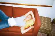 (July 2002) Sasha Garofalo on couch