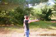 (The Farm, July 2002) Sasha Garofalo with East German Makarov