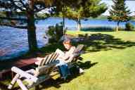 (Minocqua, July 2002) Sasha Garofalo on chair
