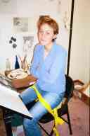 (Chez Zak, January 2003) Sasha taped to chair