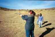 (Chez Maly, January 2003) Lisa shooting S&W 629
