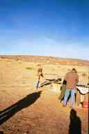 (Chez Maly, January 2003) Abe loading mags, John fiddling