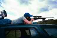 (June 2003 Shutzenfest) Sasha shoots the 243 from the roof