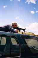 (June 2003 Shutzenfest) Zak shoots the AR-15 from car roof