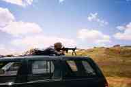 (June 2003 Shutzenfest) Zak shoots the AR-15 from car roof