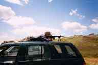 (June 2003 Shutzenfest) Zak shoots the AR-15 from car roof