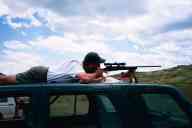 (June 2003 Shutzenfest) Rob shoots the .243 from the roof