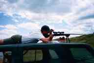 (June 2003 Shutzenfest) Rob adjusts the scope for his tricky shot