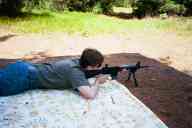 (Shooting at Farm, July 2003) Max shoots the AR-15 prone