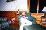 (Chez Condon, Monocqua, July 2003) Katie sprawling on chair