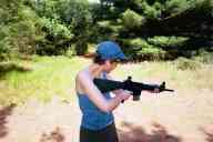 (Shooting at Farm, July 2003) Sasha redies the AR-15