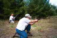 (Shooting at Farm, July 2003) Mom shoots the BHP