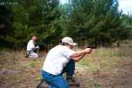 (Shooting at Farm, July 2003) Mom shoots the BHP; Dad reloads AR-15