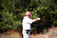 (Shooting at Farm, July 2003) Dad shoots the BHP
