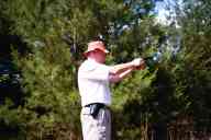 (Shooting at Farm, July 2003) Dad shoots the BHP