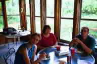 (Farm, July 2003) Sasha, Mom, Abe eating dinner on porch